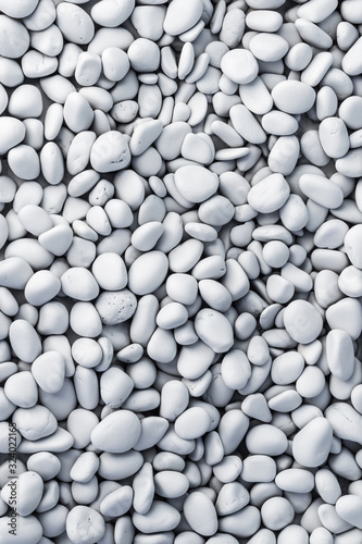 texture of white painted pebbles