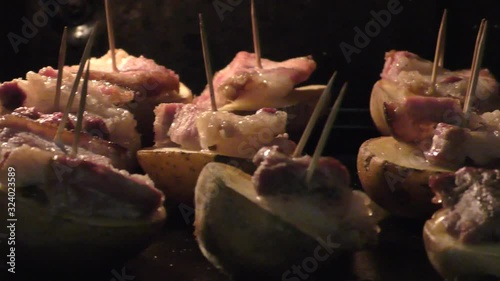 Food photo. Roasted meat in the oven. The undercoats are baked in a potato oven. Home kitchen. Healthy food.