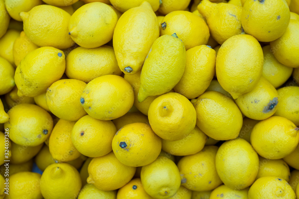 top view of a lemon texture, behind a store counter. Healthy and Sour Vitamin Fruit