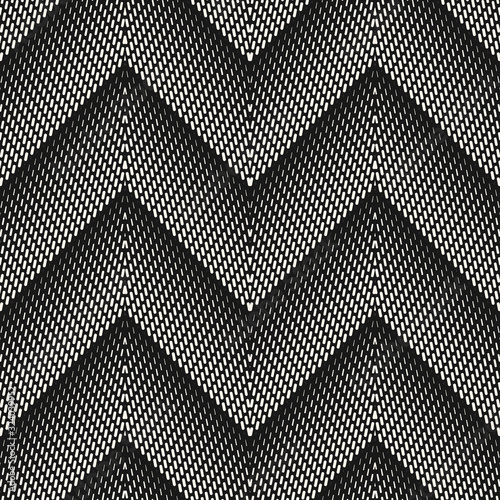 Vector geometric halftone seamless pattern with small lines, fading stripes, zigzag, chevron. Gradient transition effect. Sport style monochrome background. Abstract black and white texture design