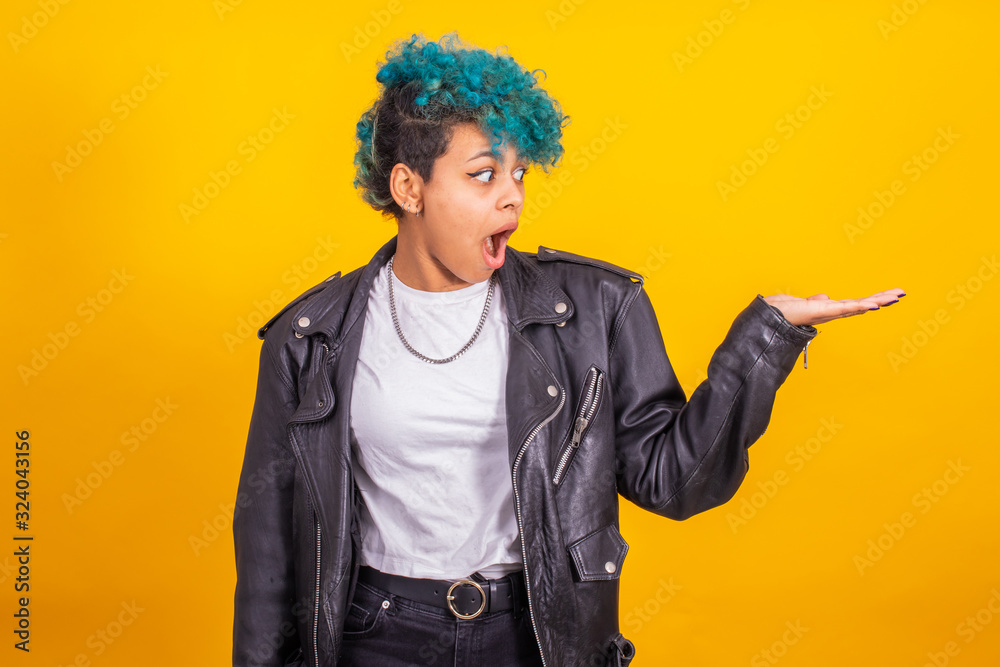 young girl isolated on color background pointing space for ads or text young girl isolated on color background pointing space for ads or text