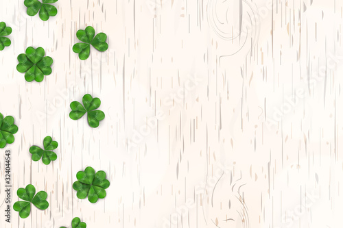 Happy St. Patrick's day. St patricks day design with shamrock clover leaf, Irish festival symbol on wooden background. Space for your text. Design for banner, card, poster, invitation, postcard.