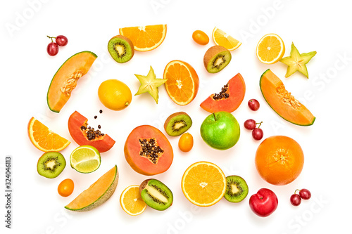 Fototapeta Naklejka Na Ścianę i Meble -  Fruits healthy food layout. Papaya, orange, apple, kiwi, melon isolated on white. Detox fruity health vitamin diet creative concept. Colorful fresh raw fruit tropical background, top view.