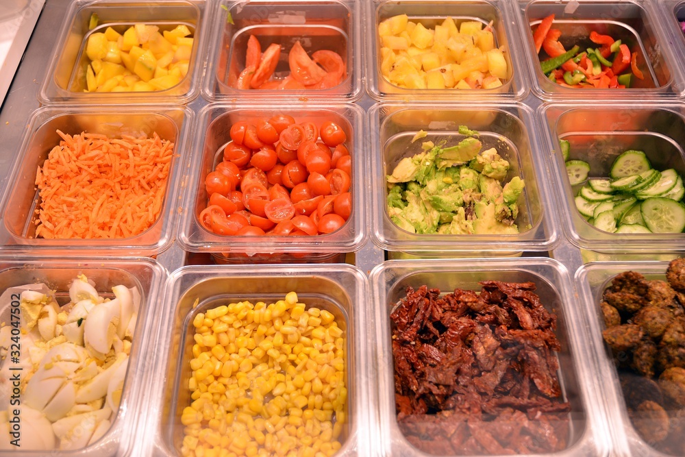 Salad bar with vegetables in the restaurant, healthy food. Salad bar with vegetables in the restaurant, healthy food.