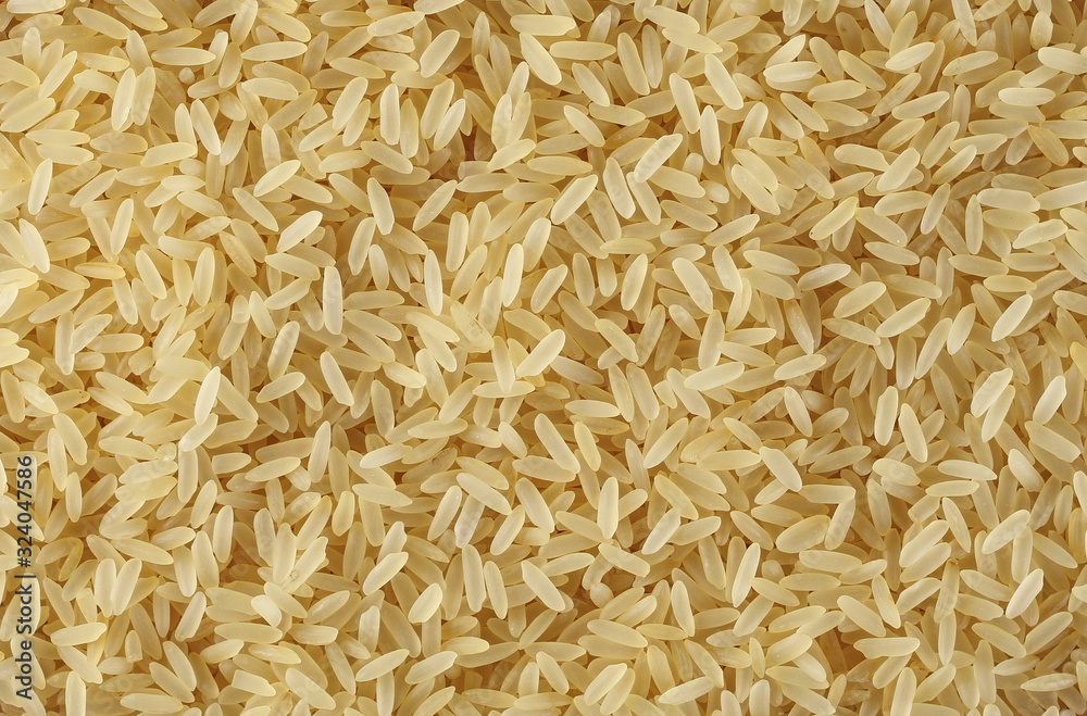Parboiled rice background and texture