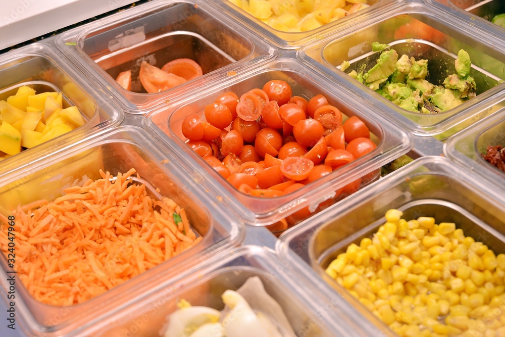 Salad bar with vegetables in the restaurant, healthy food.