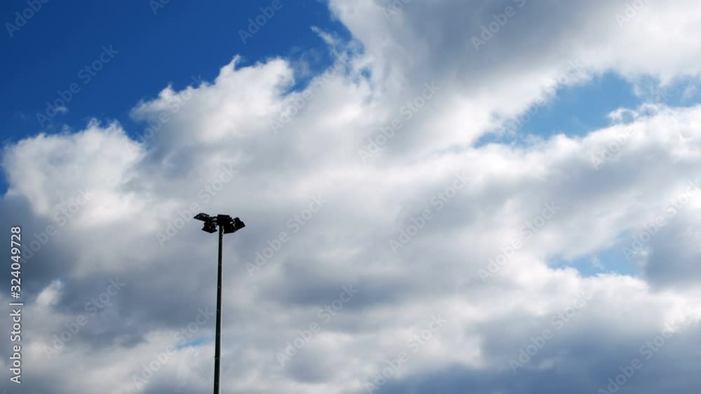 The Electric Pole and Clouds Behind The Electric Pole and Clouds Behind