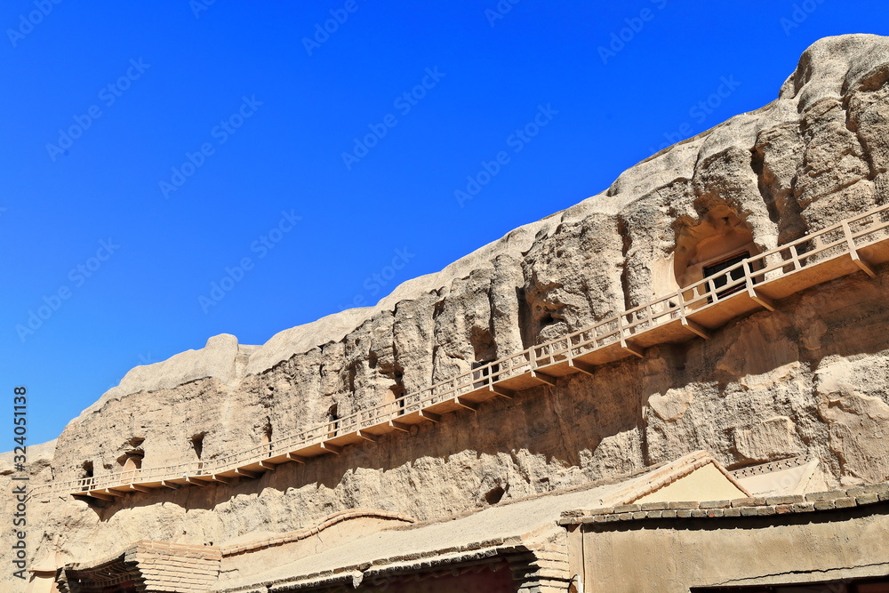 Yulin caves facade-plank path along the cliff. Guazhou county-Gansu province-China-0717
