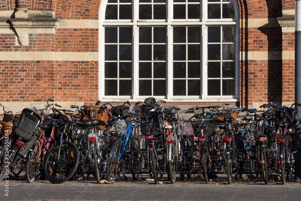 Large number of bicycles parked in front of the Main Train station. Bicycles are one of the main modes of transportation in the Copenhagen