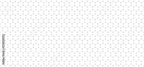 Light gray abstract background with triangles. Seamless vector pattern.