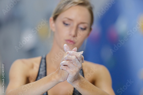 close-up of climbers hands with chalk