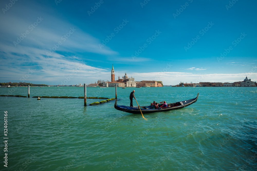 view with blue gondolas from San Marco Square towards Murano Island 