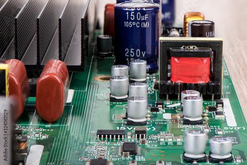 Capacitors, microcircuits and other electronic components close-up. photo