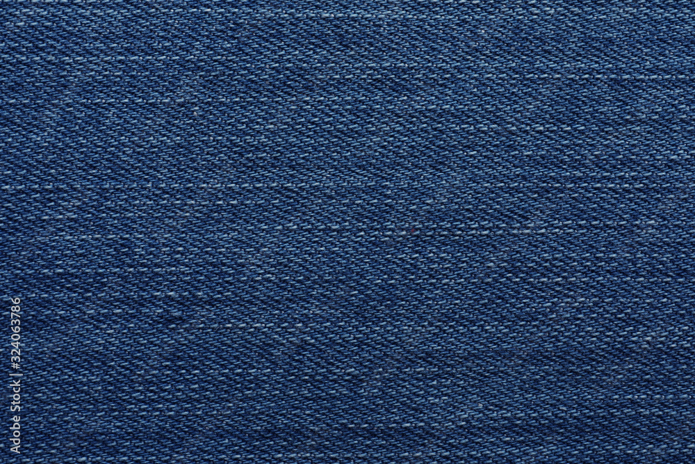 Texture of blue jeans as background, closeup Texture of blue jeans as background, closeup