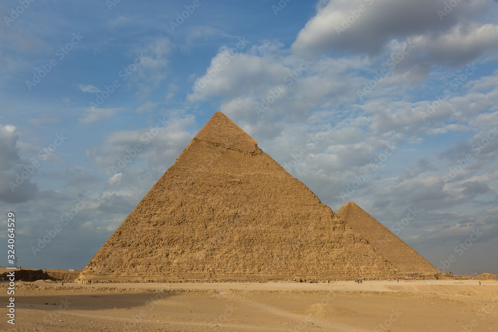 Famous great Giza Pyramids in sand desert in Cairo. Famous great Giza Pyramids in sand desert in Cairo.