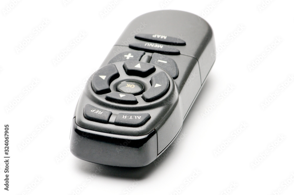 Remote control for digital TV tuners, music players, navigator and disk drives on a white background Remote control for digital TV tuners, music players, navigator and disk drives on a white background
