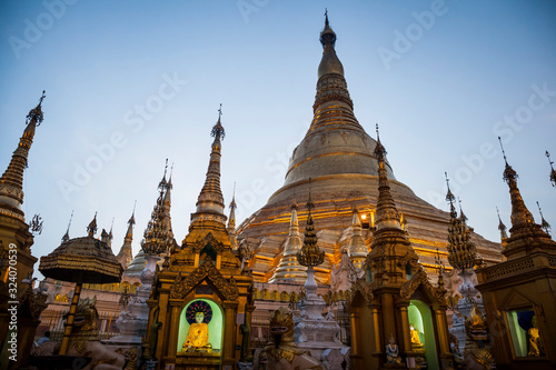 Exterior view of Buddhist pagoda with gilded stupa.,Yangon