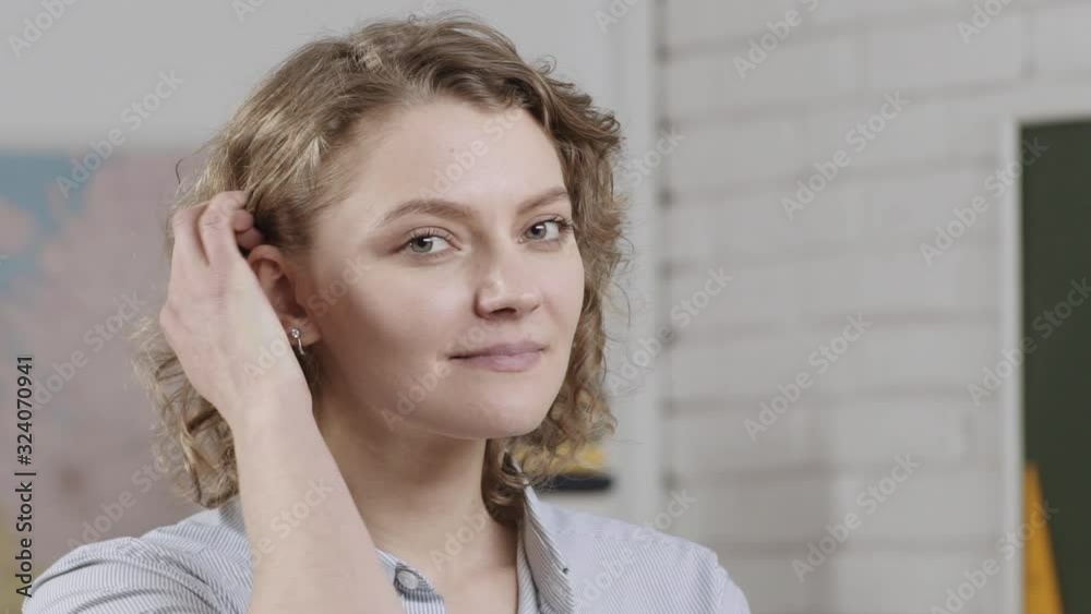 Funny office workers. Portrait of young smiling Businesswoman. Business woman portrait close up. Slow motion 100 fps. Funny office workers. Portrait of young smiling Businesswoman. Business woman portrait close up. Slow motion 100 fps.