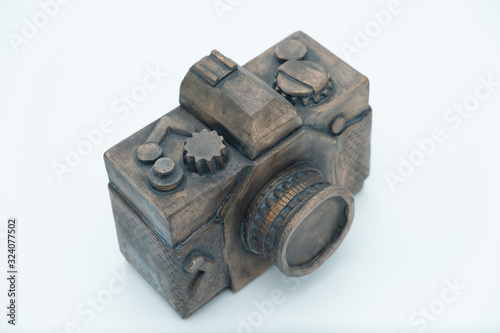  ceramic camera sculpture on white background