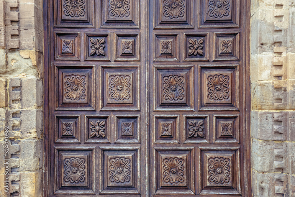 Close up on a door of chapel in Revillagigedo Palace building in Gijon city, Spain