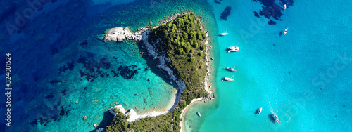 Fototapeta Naklejka Na Ścianę i Meble -  Aerial drone ultra wide photo of tropical Caribbean bay with white sand beach and beautiful turquoise and sapphire clear sea