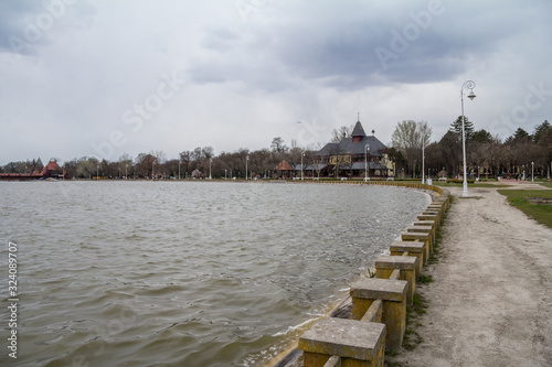 Panorama of Palic Lake, or Palicko Jezero, in Palic, Serbia, with the Velika Terasa, or Grand Terrace main building in the background. it is one of the main attractions of Vojvodina province photo