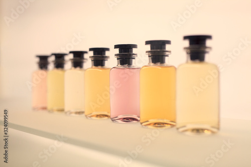 Perfume glass bottle mockup, blank cosmetic bottles template.  selective focus.