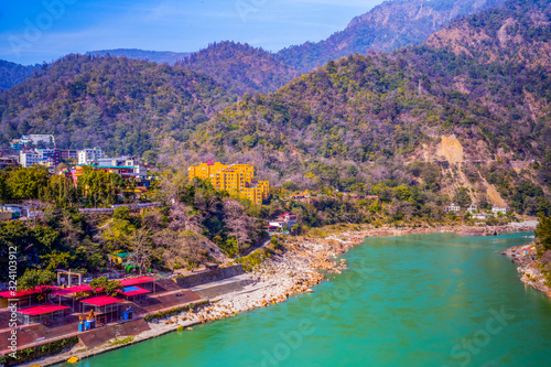 A view on Rishikesh, Ganga river and mountains.