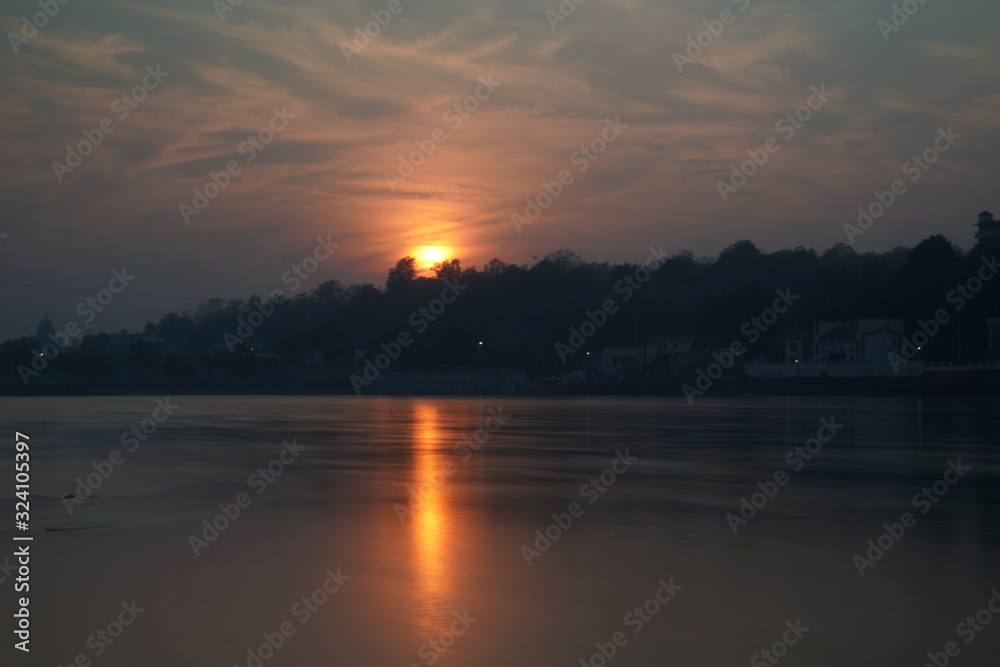 Beautiful sunset view of the river Ganga in Rishikesh, India