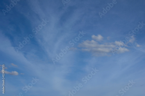 Beautiful blue sky and white fluffy clouds, Vibrant color sky with cloud on a sunny day, The morning sky with clouds in various shapes, Beautiful natural cirrus cloud background. © Digital Art Studio