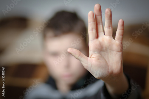 Stop hand of child, sign of anti violence