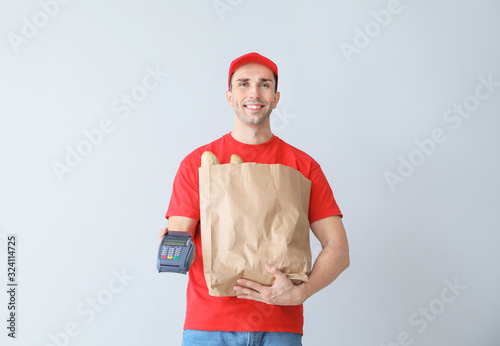 Handsome worker of food del...