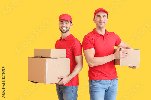 Delivery men with boxes on ...