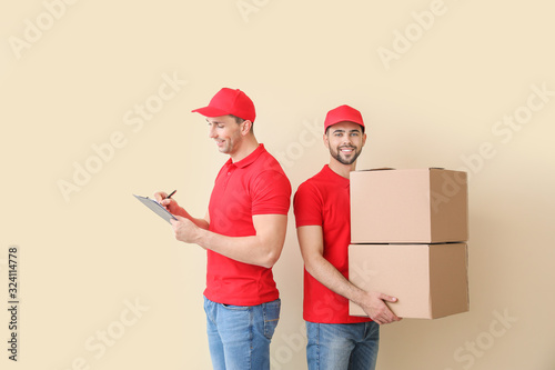 Delivery men with boxes on ...