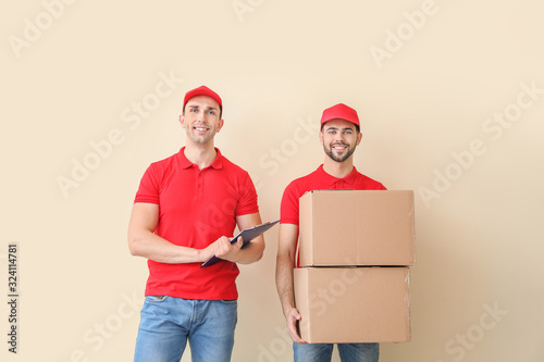 Delivery men with boxes on ...
