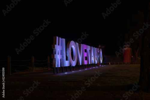 Love Taupo promotional sign at night photo