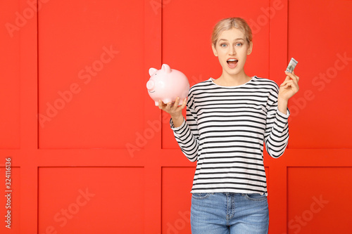 Surprised young woman with ...