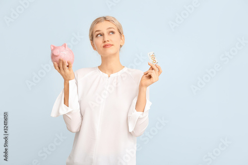 Thoughtful young woman with...