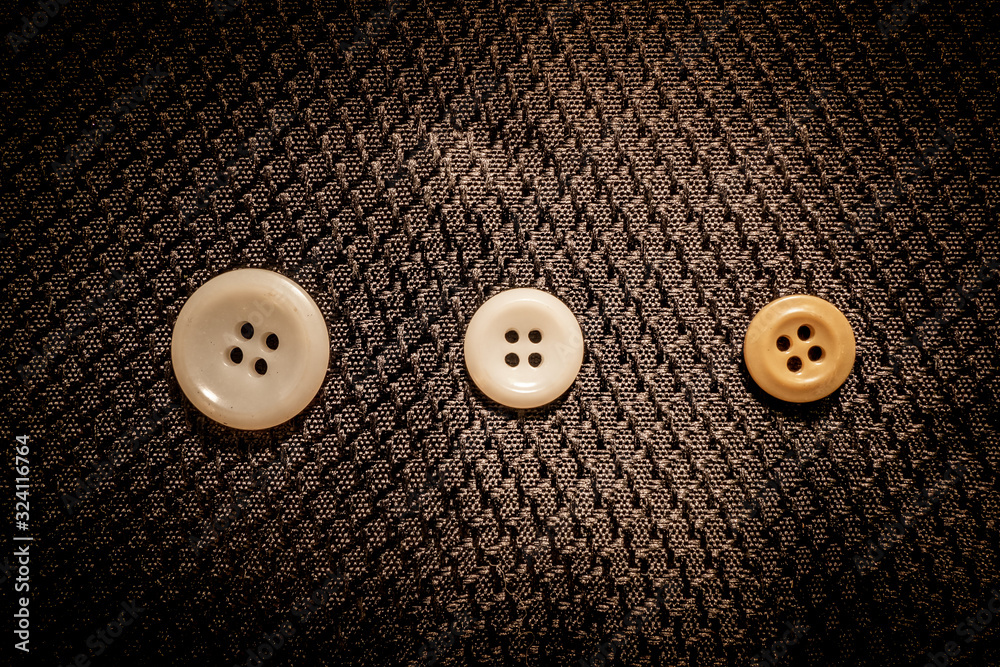 colored buttons in a row on black background colored buttons in a row on black background