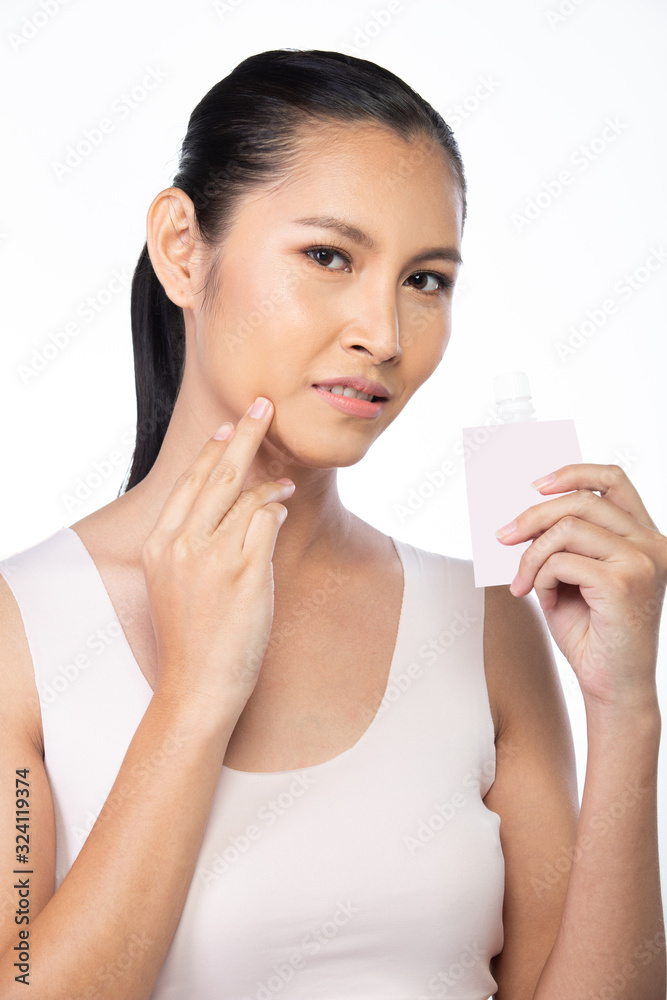20s Asian Young Woman has Beautiful smooth skin and whitening clean. Girl wakes up in morning and feel fresh smile laugh like using treatment lotion. Studio white background isolated copy space 20s Asian Young Woman has Beautiful smooth skin and whitening clean. Girl wakes up in morning and feel fresh smile laugh like using treatment lotion. Studio white background isolated copy space