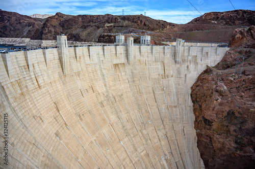Back side of Hoover Dam showing concrete and rock walls