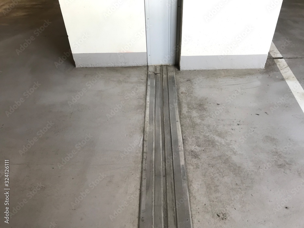 An Construction Expansion joint is covered Materials plate made of ...