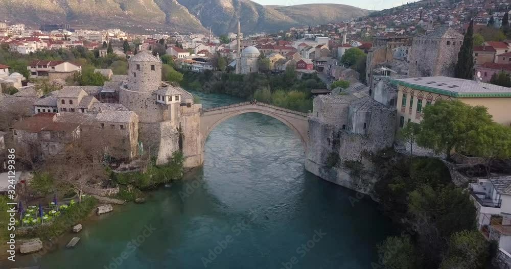 Aerial view of Stari Most, Mostar Bosnia, drone flies backward, tilt up shot. Aerial view of Stari Most, Mostar Bosnia, drone flies backward, tilt up shot.
