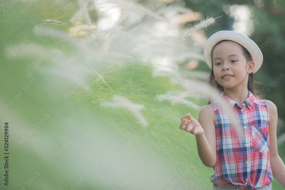 traveler or tourism. happy little asian girl child in flower fields with big smile and laughing healthy happy funny smiling face young adorable lovely female kid. happy lifestyle concept. traveler or tourism. happy little asian girl child in flower fields with big smile and laughing healthy happy funny smiling face young adorable lovely female kid. happy lifestyle concept.