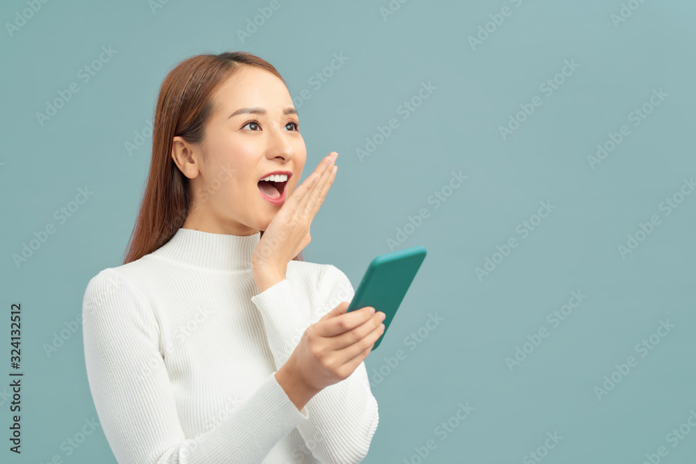 Photo of funny funky lady using her interesting digital gadget isolated violet background Photo of funny funky lady using her interesting digital gadget isolated violet background