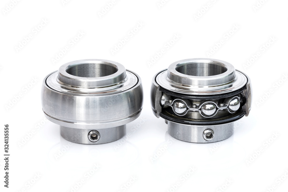 Close-up stainless steel bearings on the white background. Close-up stainless steel bearings on the white background.