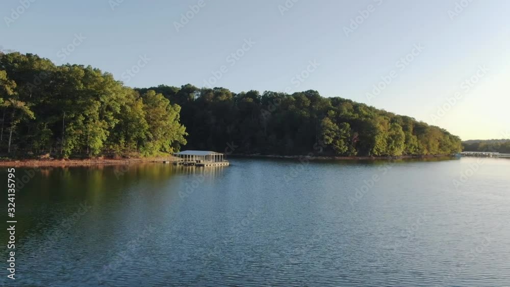 low altitude aerial approach toward boat house low altitude aerial approach toward boat house