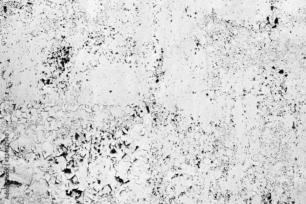 Texture of a metal wall with cracks and scratches which can be used as a background Texture of a metal wall with cracks and scratches which can be used as a background