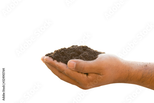 Hand holding mixed soil for plant isolated on white background