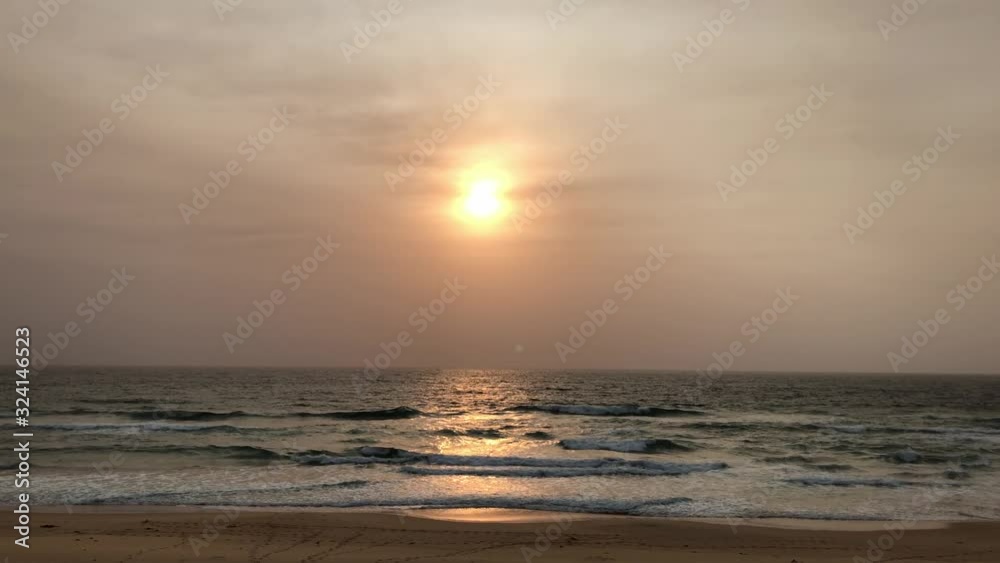 Hazy sunrise view over the beach. Hazy sunrise view over the beach.